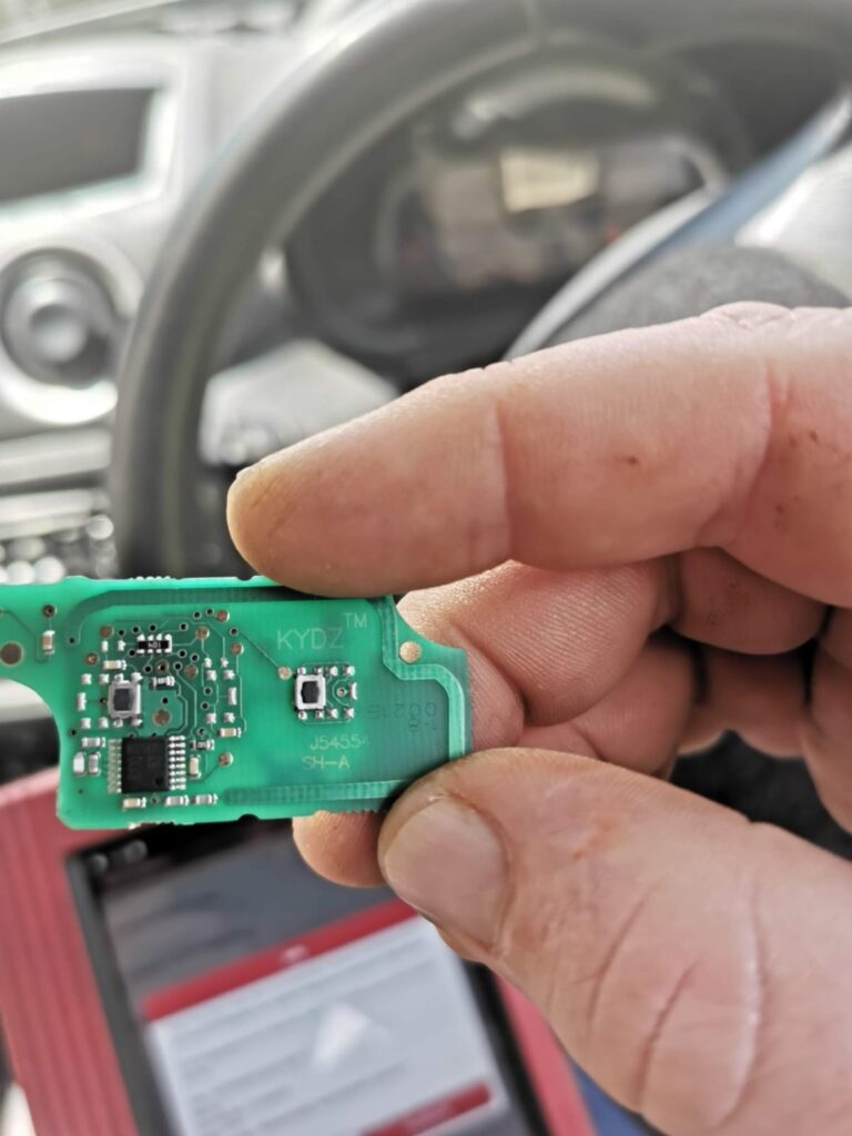 Remote key circuit board held inside a vehicle