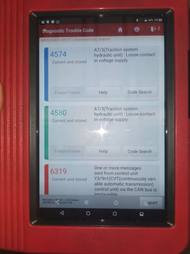 Diagnostic tablet displaying vehicle fault codes